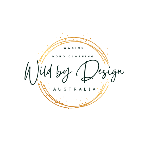 wild by design logo in black writing and a gold circle